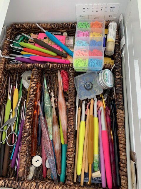 inside my crochet bag photo of crochet hooks inside a drawer organizer 