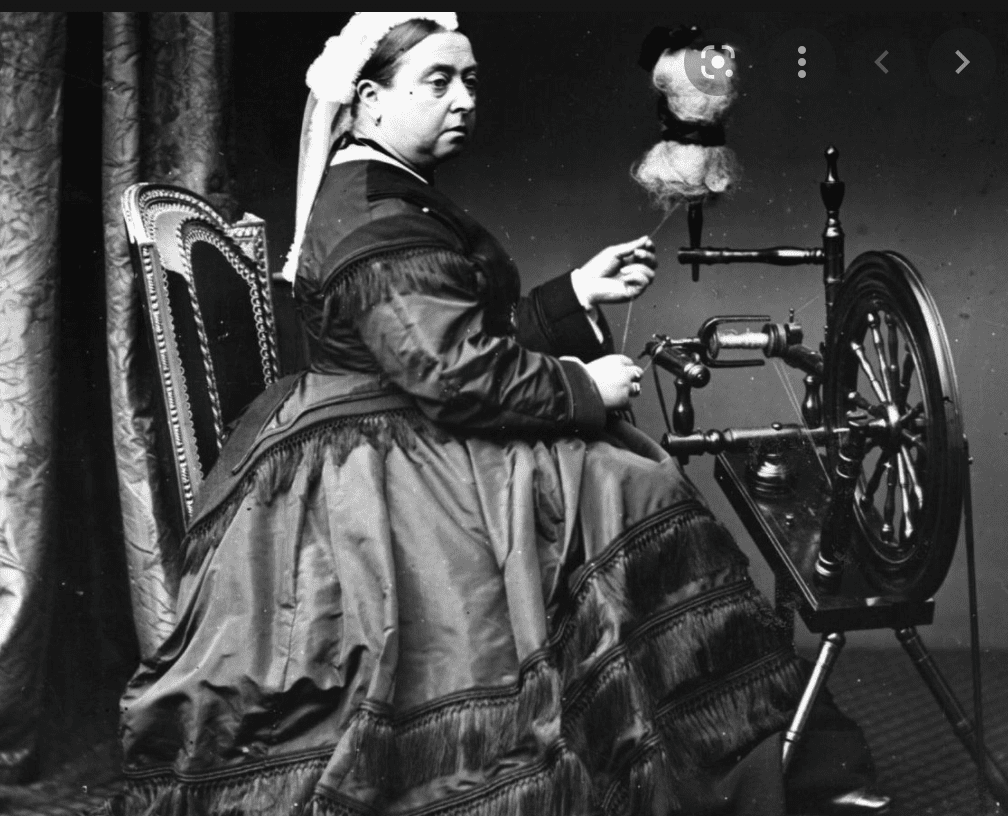 Queen Victoria crochet photo of the queen at a spinning wheel