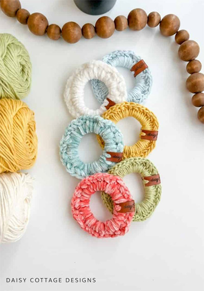 crochet stocking stuffers photo of pastel scrunchies photo credit to Daisy Farm Crafts