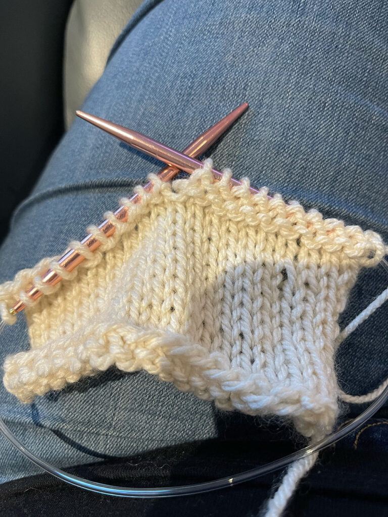 picture of stockinette stitch with some purl stitches showing lifelong crocheter learning to knit photo 