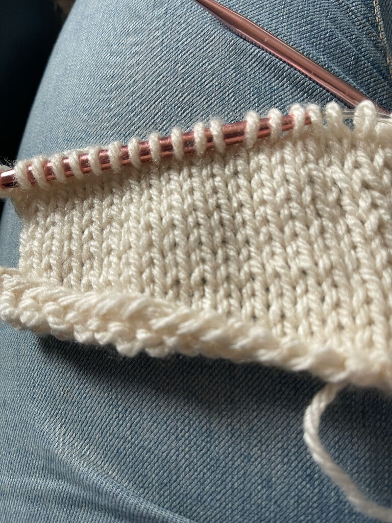 picture of stockinette stitch on the needles lifelong crocheter learning to knit photo 