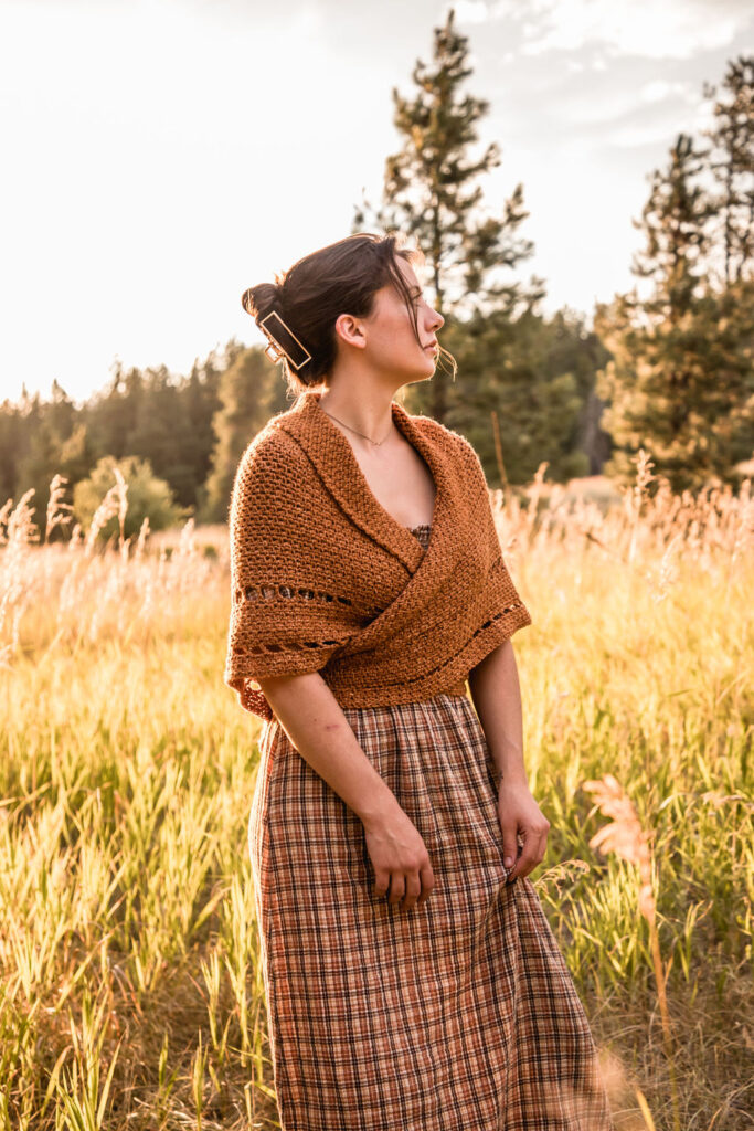 photo of Ashtin in her Ma Prairie's Shawl in a meadow 